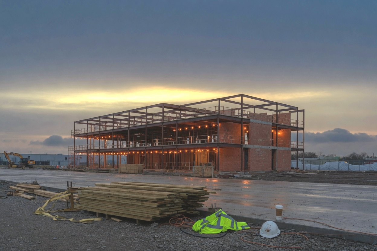 Steel and brick commercial frame at first light